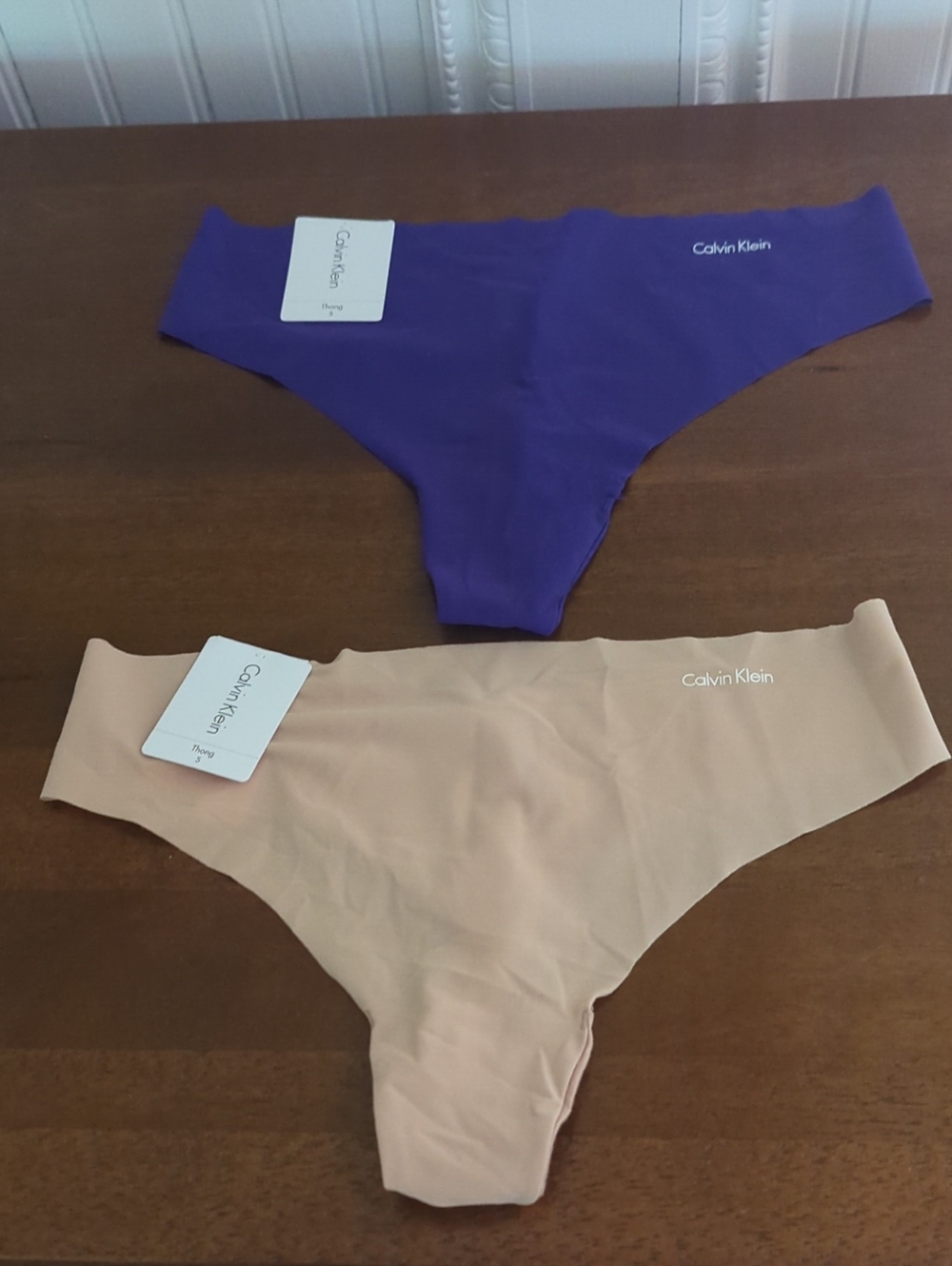 Calvin Klein Seamless Thong Panties in Purple and Nude